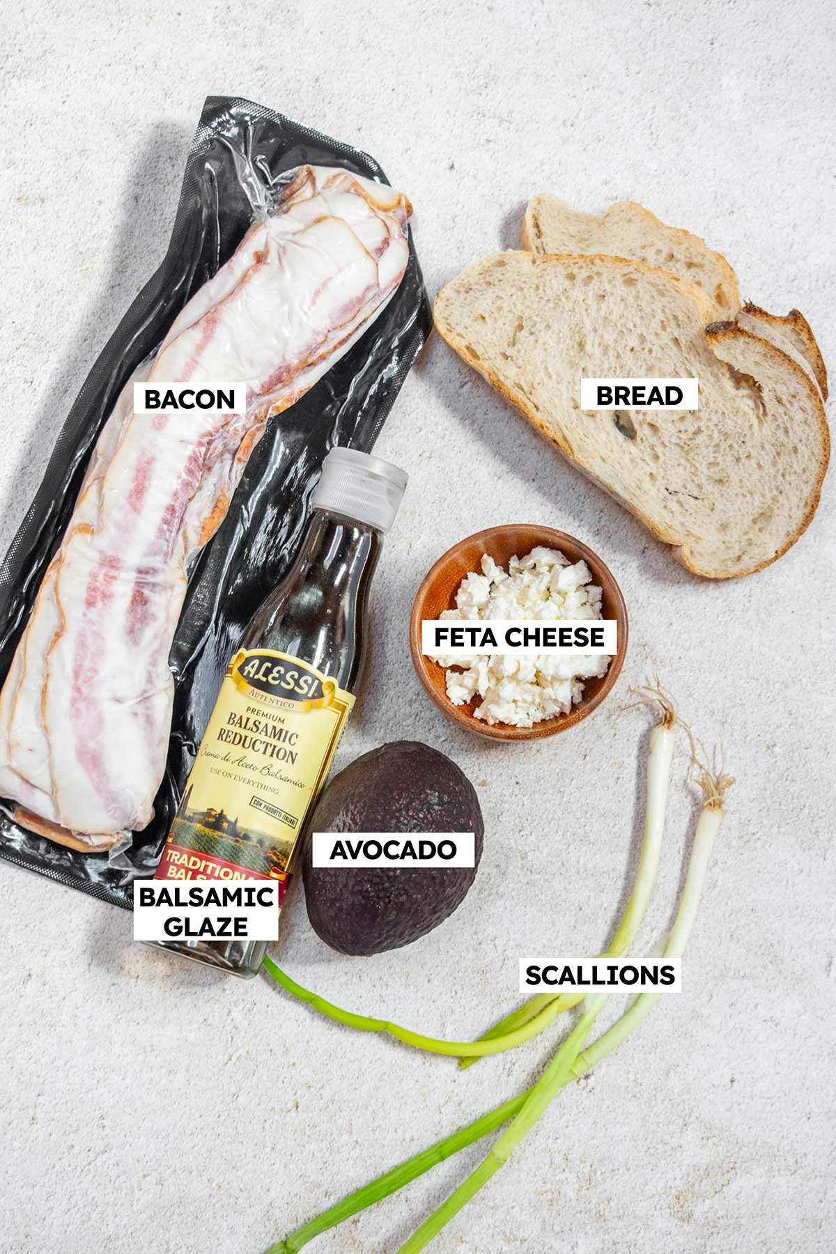 Bacon Avocado Toast Ingredients- bacon, bread, feta, scallion, balsamic glaze. 