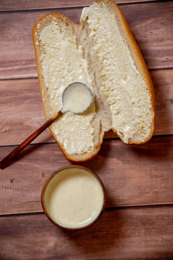 Coat the inside of the rolls with the mayo spread in an even layer