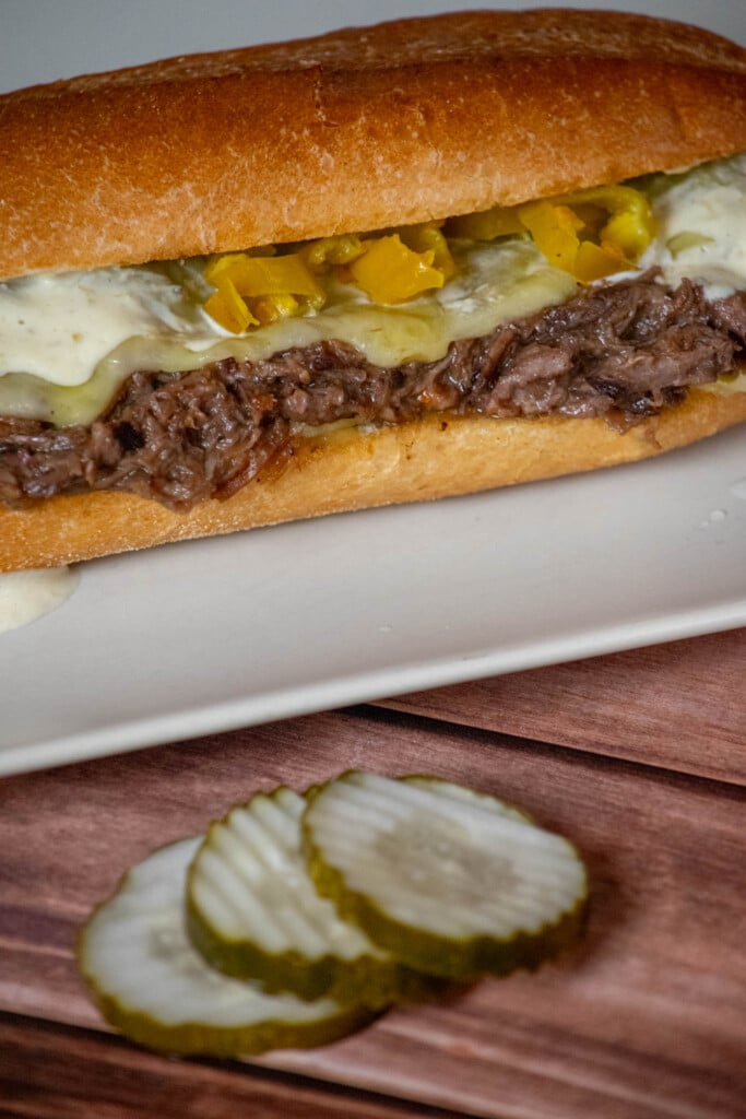Top with additional horseradish mayo, pepperoncini peppers, or pickles, if desired 