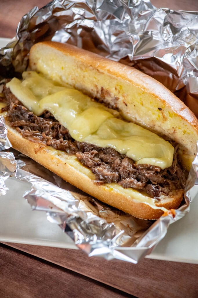 Bake in preheated oven until cheese is melted through and roll is slightly crisp 