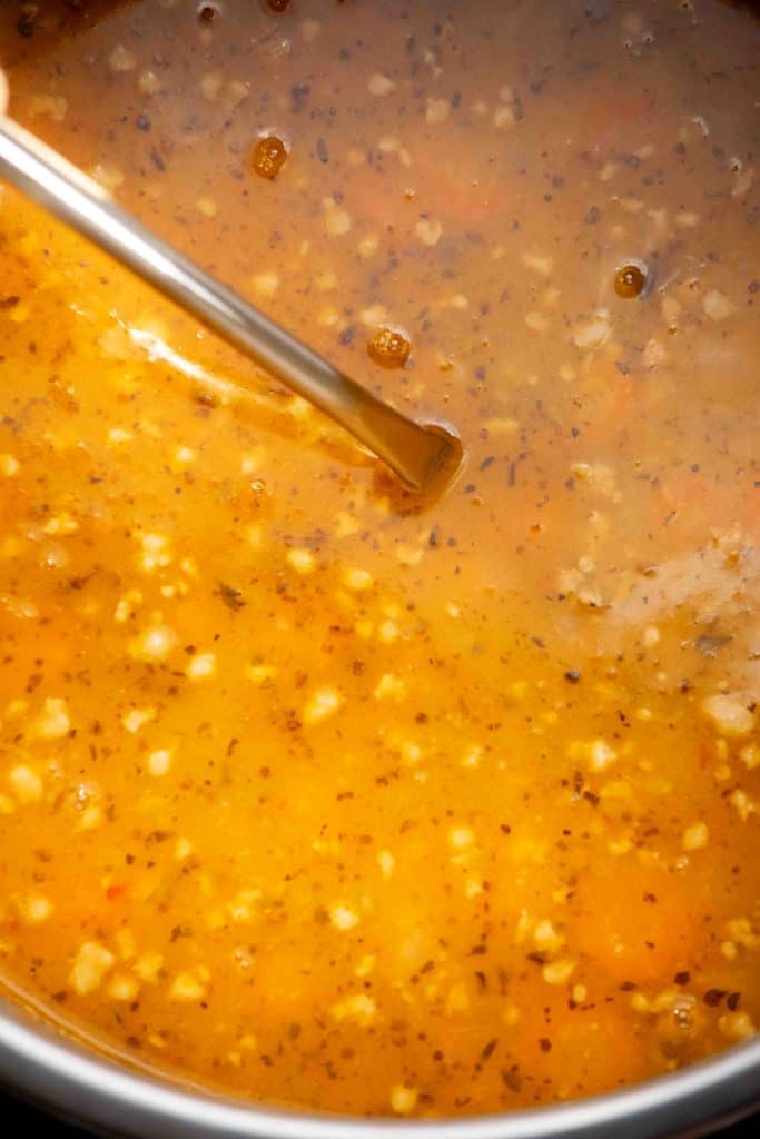 cook on high pressure, natural release, and remove parmesan rind and bay leaves