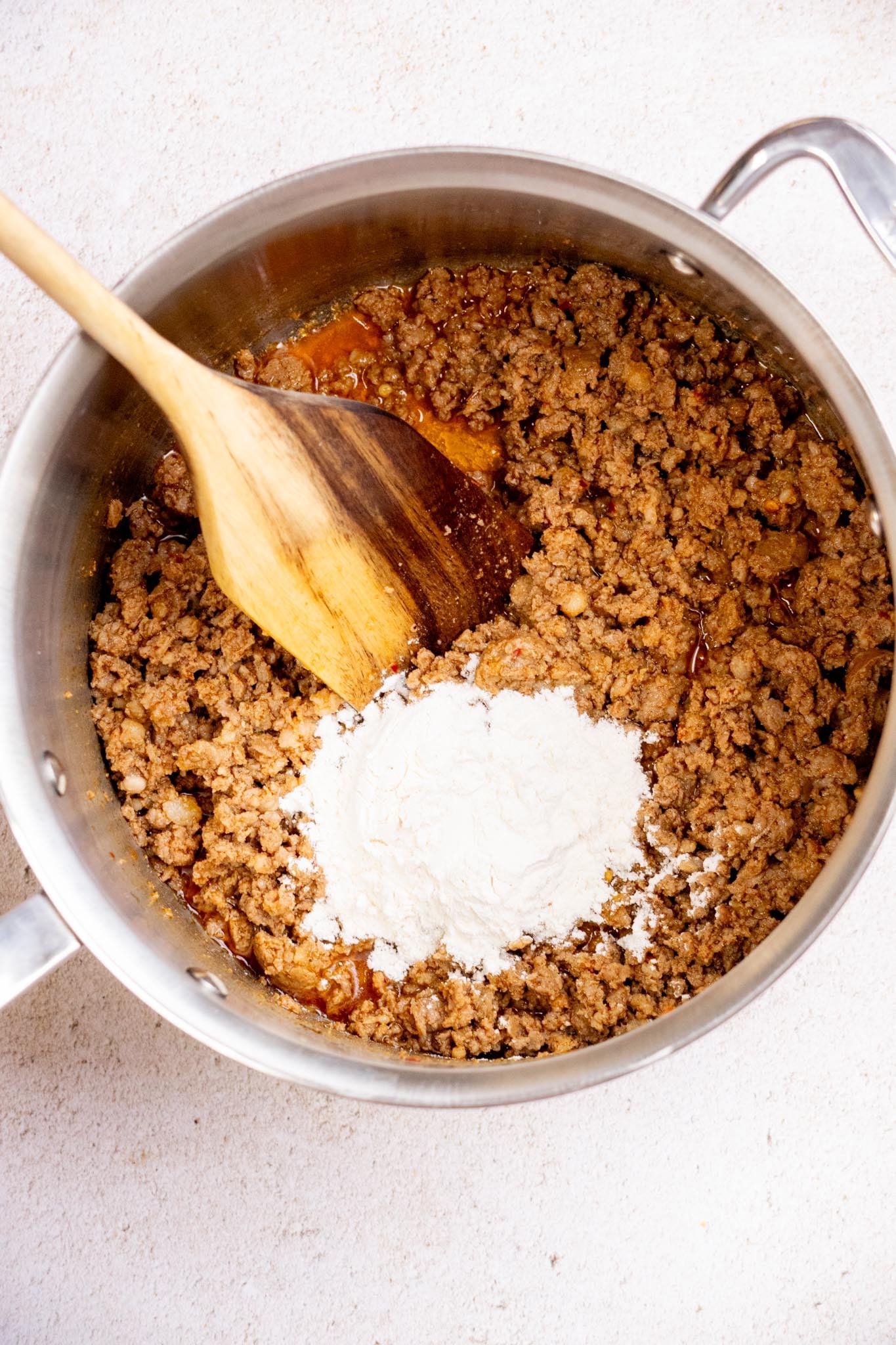 Add the flour and stir until fully combined. Cook, stirring frequently, for 1–2 minutes.