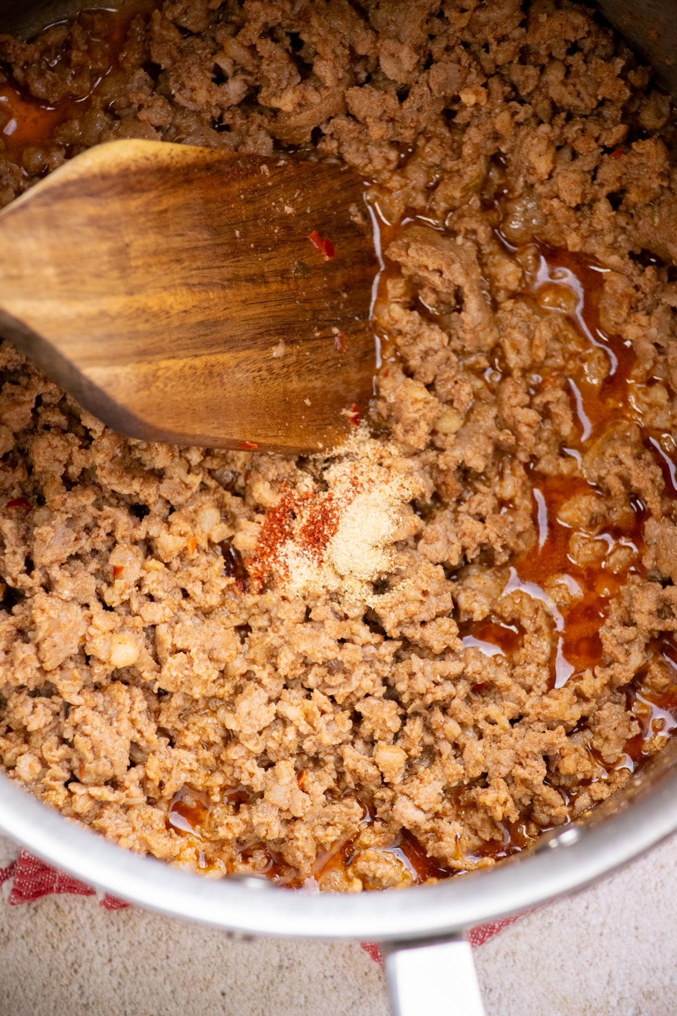 Add the garlic powder, cayenne (if using), and salt and pepper to taste.