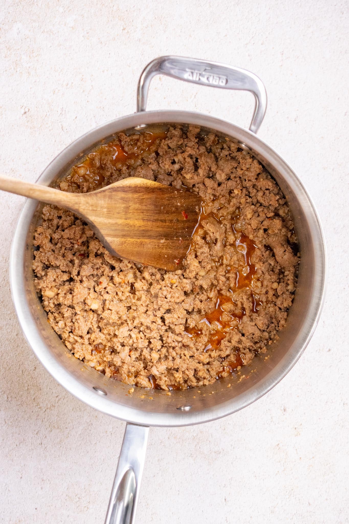 In a medium saucepan, melt the butter over medium-low heat. Add the chorizo and cook, breaking it up as it cooks, until fully cooked, about 5 minutes.