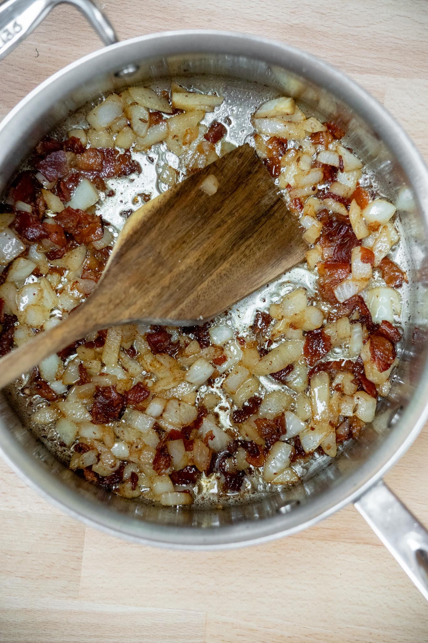 Add onions and caraway seeds and cook, stirring occasionally, for 3-5 minutes until onions soften. 
