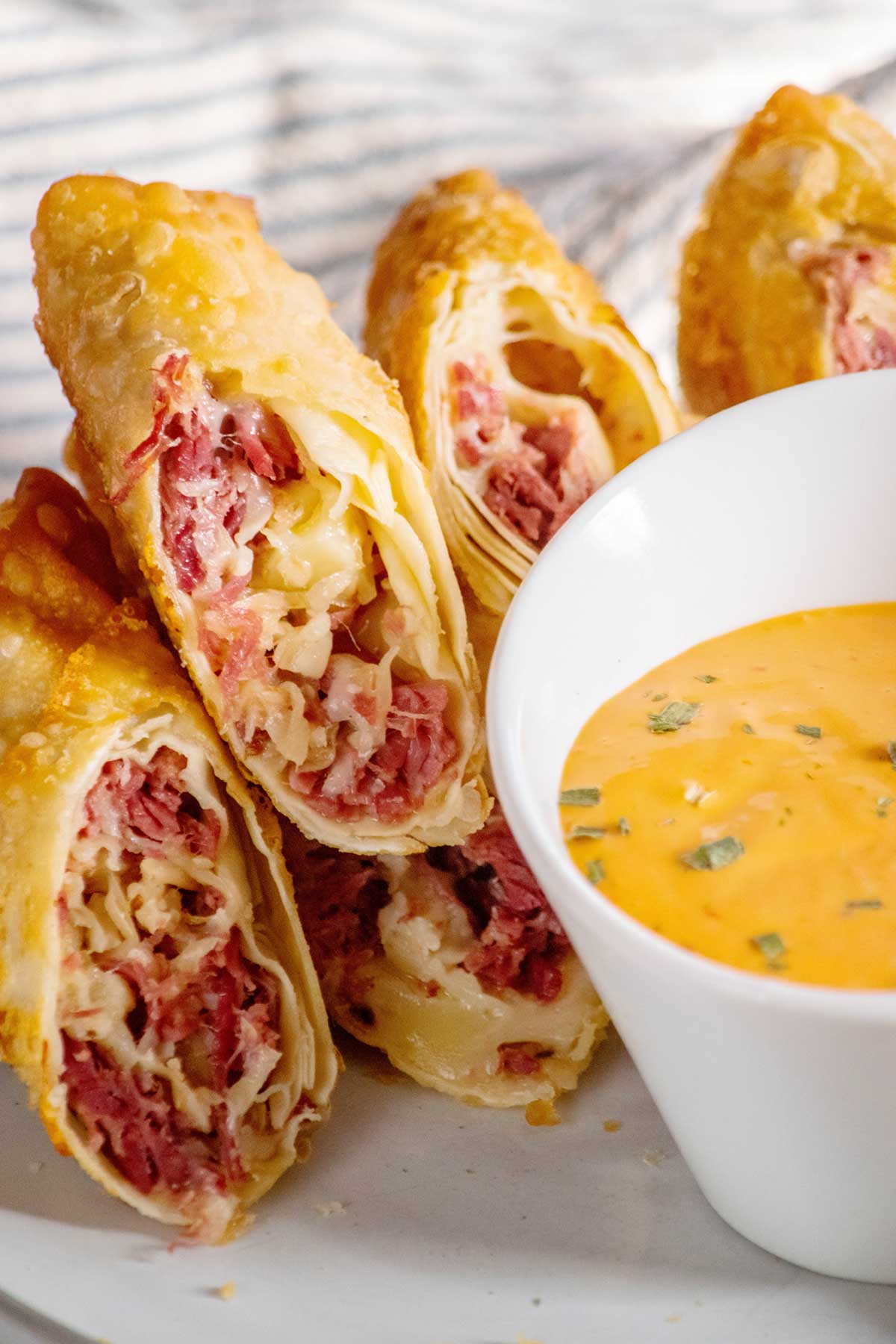 Easy Reuben Egg Rolls with Bacon Beer Sauerkraut