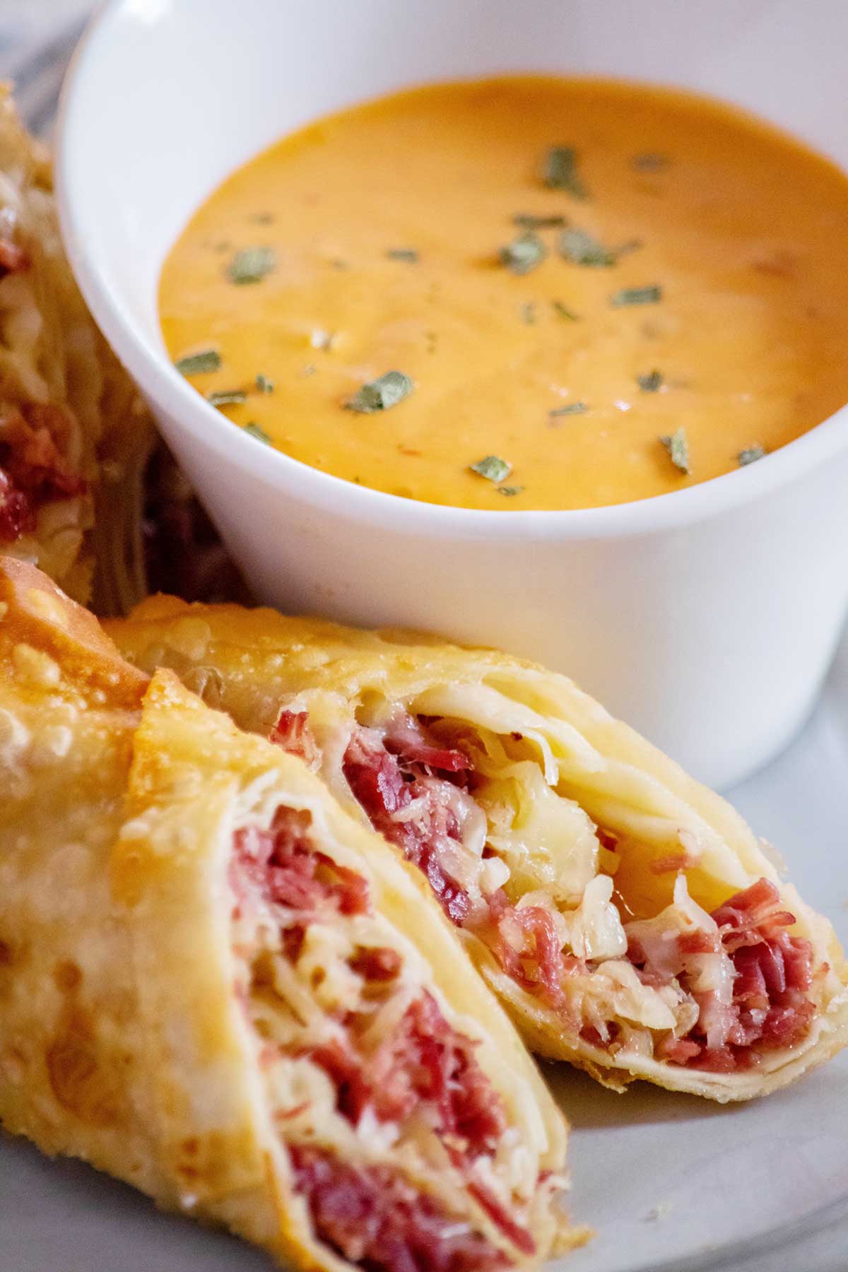 Easy Reuben Egg Rolls with Bacon Beer Sauerkraut