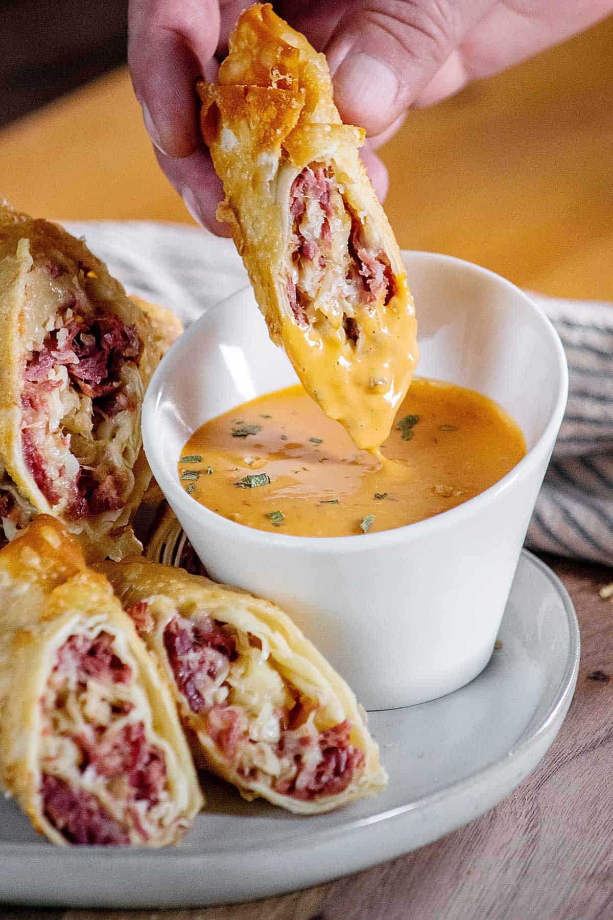Easy Reuben Egg Rolls with Bacon Beer Sauerkraut