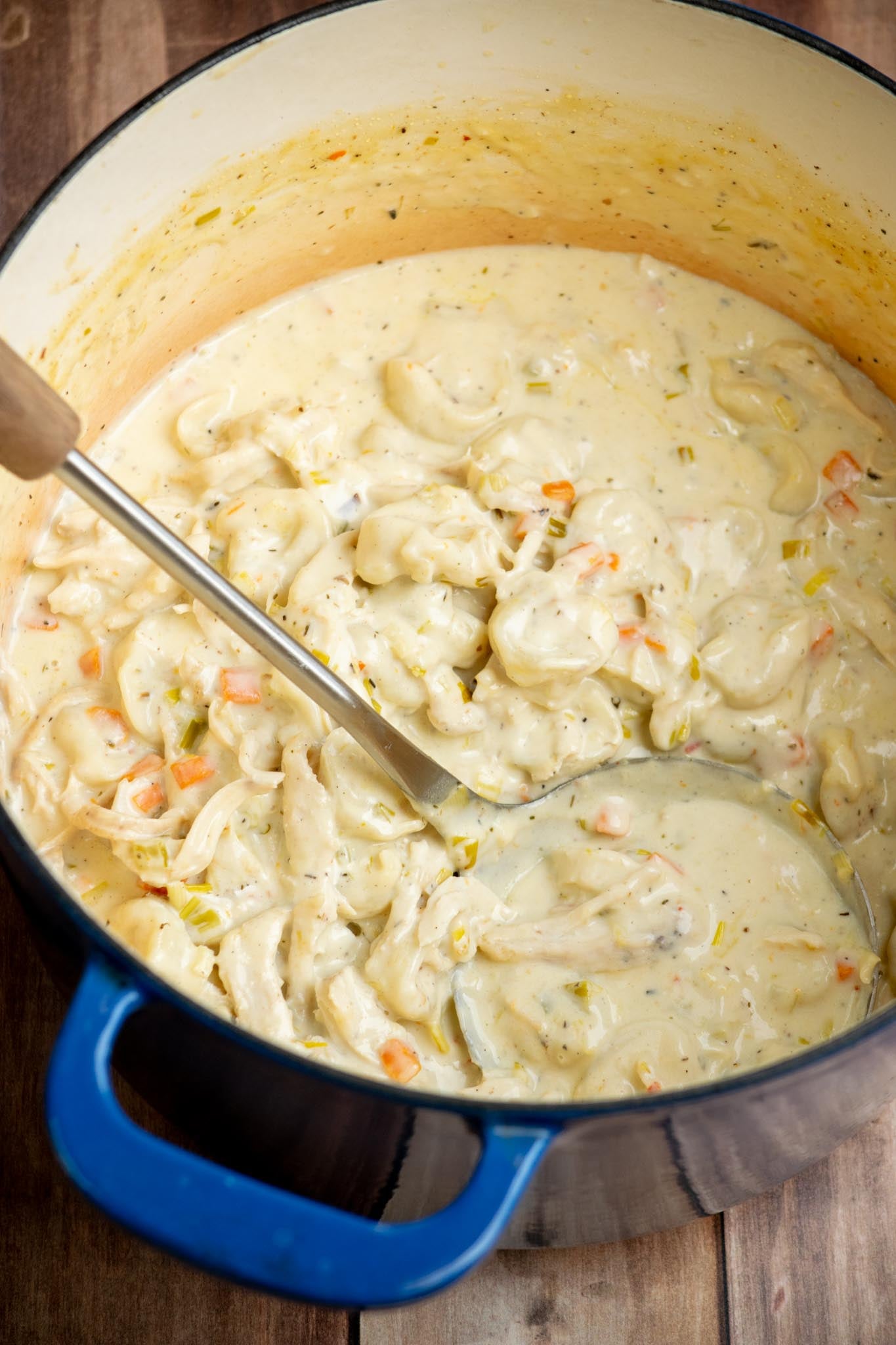 Taste and adjust the seasoning as needed, then serve hot with Parmesan and fresh parsley.