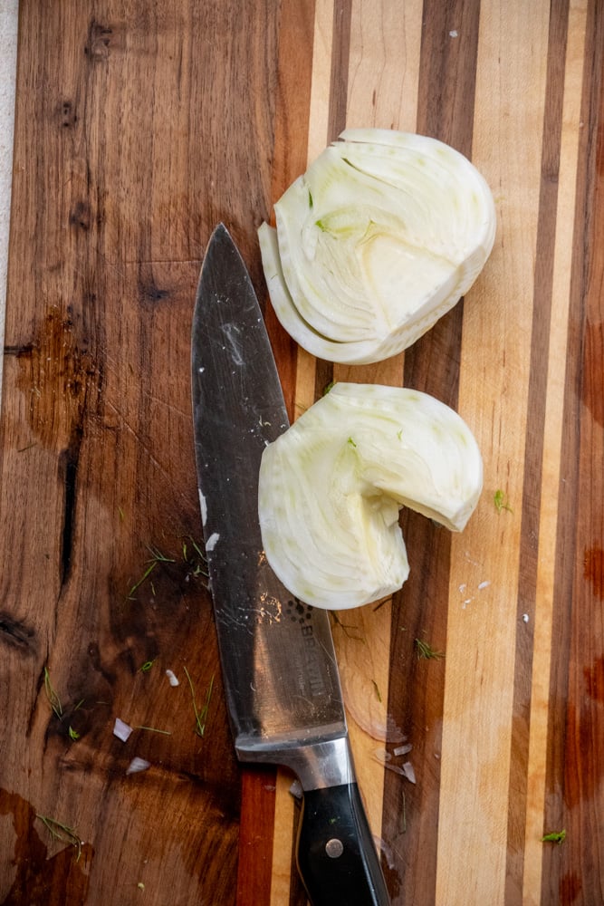slice the fennel bulb in half, and remove the inner core from each half 