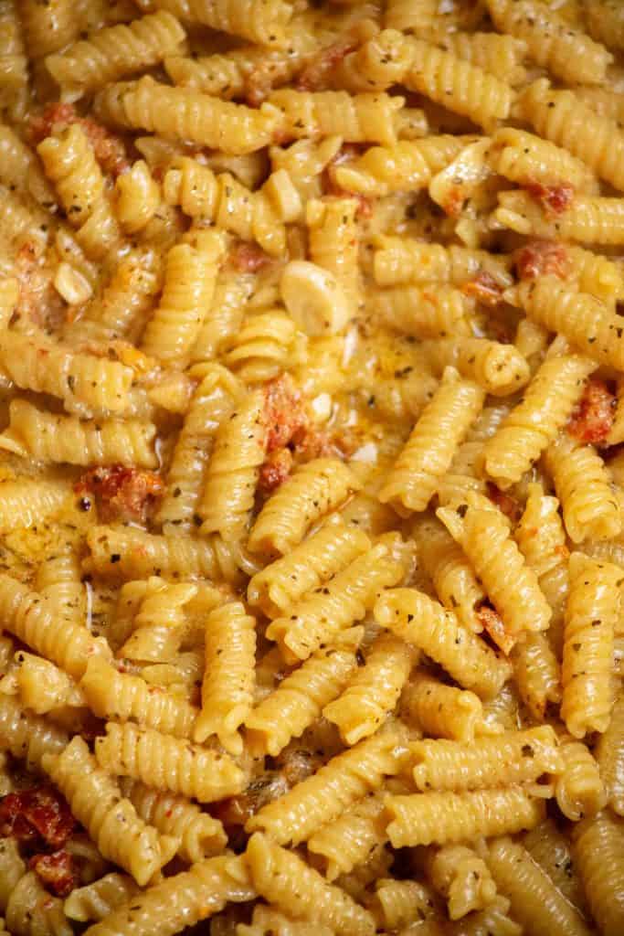 cover and cook until sauce thickens and pasta is cooked through