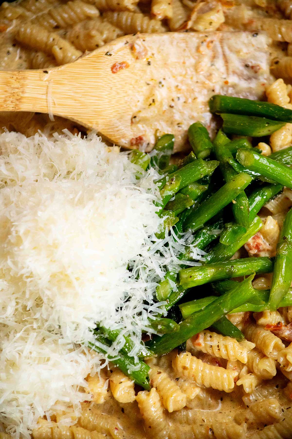 fold in cheese and reserved cooked asparagus