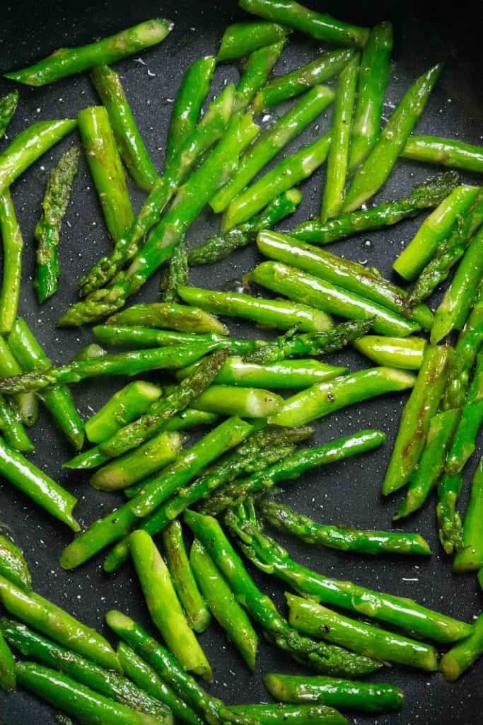 cook asparagus in olive oil until tender, then set aside
