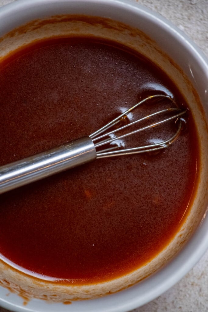 whisk together the chipotle sauce, apple cider vinegar, and honey to make the glaze. 