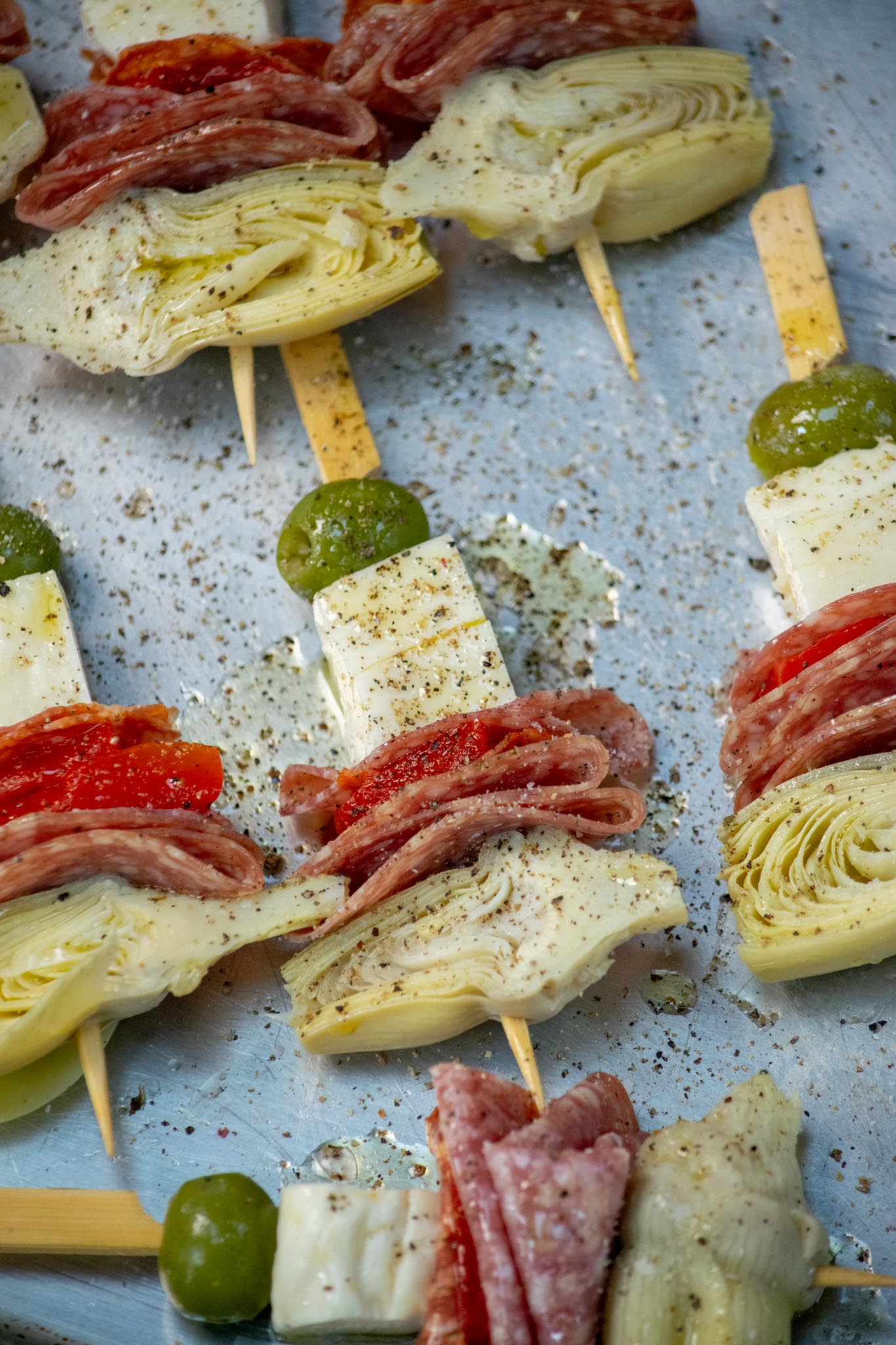 Brush with olive oil, and season with salt and pepper. 