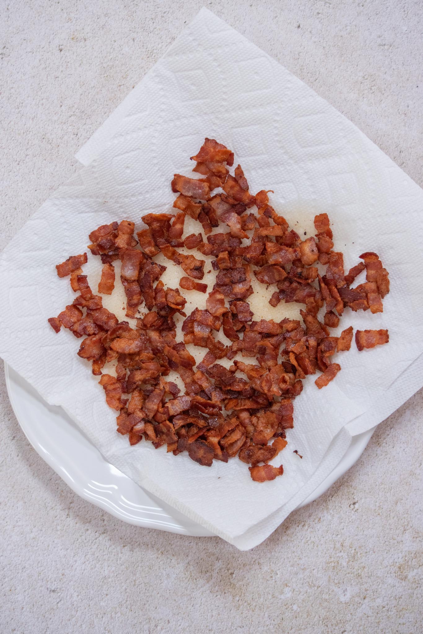 Remove from the pan and drain on paper towels. 