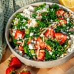Easy Kale Salad with Strawberries and Feta in a bowl.