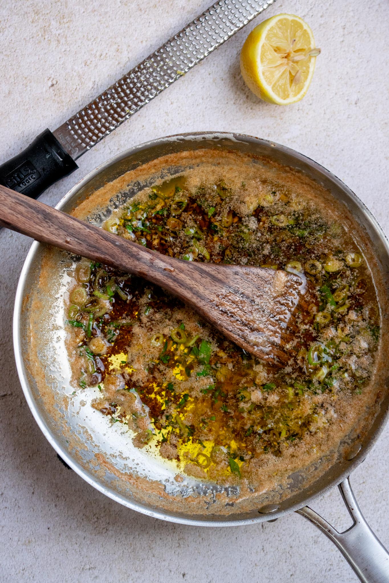 Once cooled slightly, stir in the lemon juice and zest to preserve their citrus flavor.