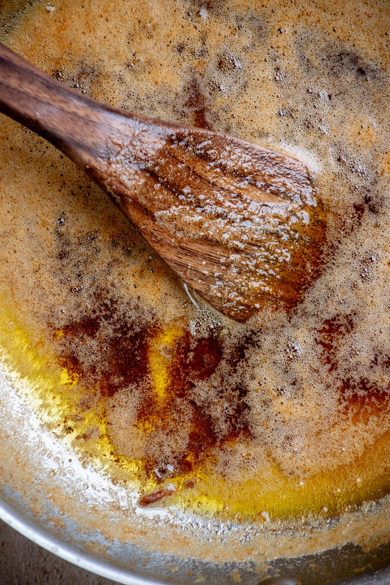 Add the finely chopped anchovies off-heat (butter will still be very hot), and stir for 1-2 minutes to meld them into the browned butter.