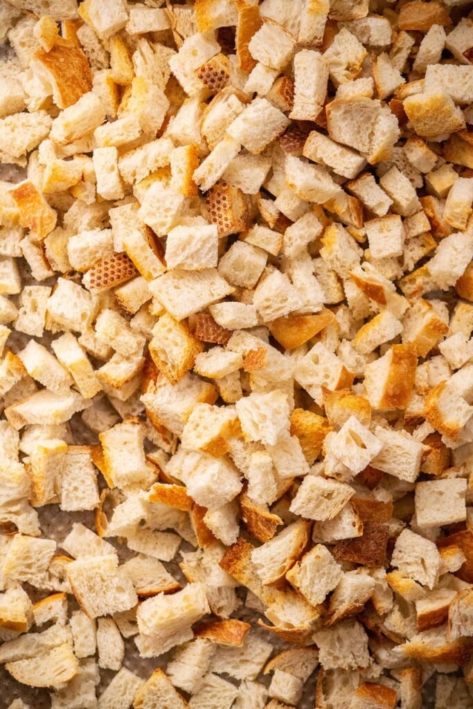 Before you assemble the stuffing, you will toast the bread in a 400 degree oven for 15-20 minutes, until the bread is dry and crisp. This will help the stuffing texture, and ensure the bread absorbs the liquid.