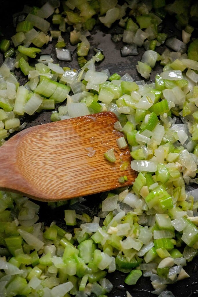 Finely chop your celery, onions and garlic. You'll cook the celery and onion in some butter and a bit of salt until softened, then add the garlic and cook until just fragrant.