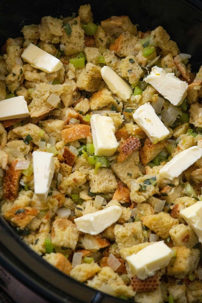 Top stuffing with remaining 4 tablespoon butter, cut into pats.