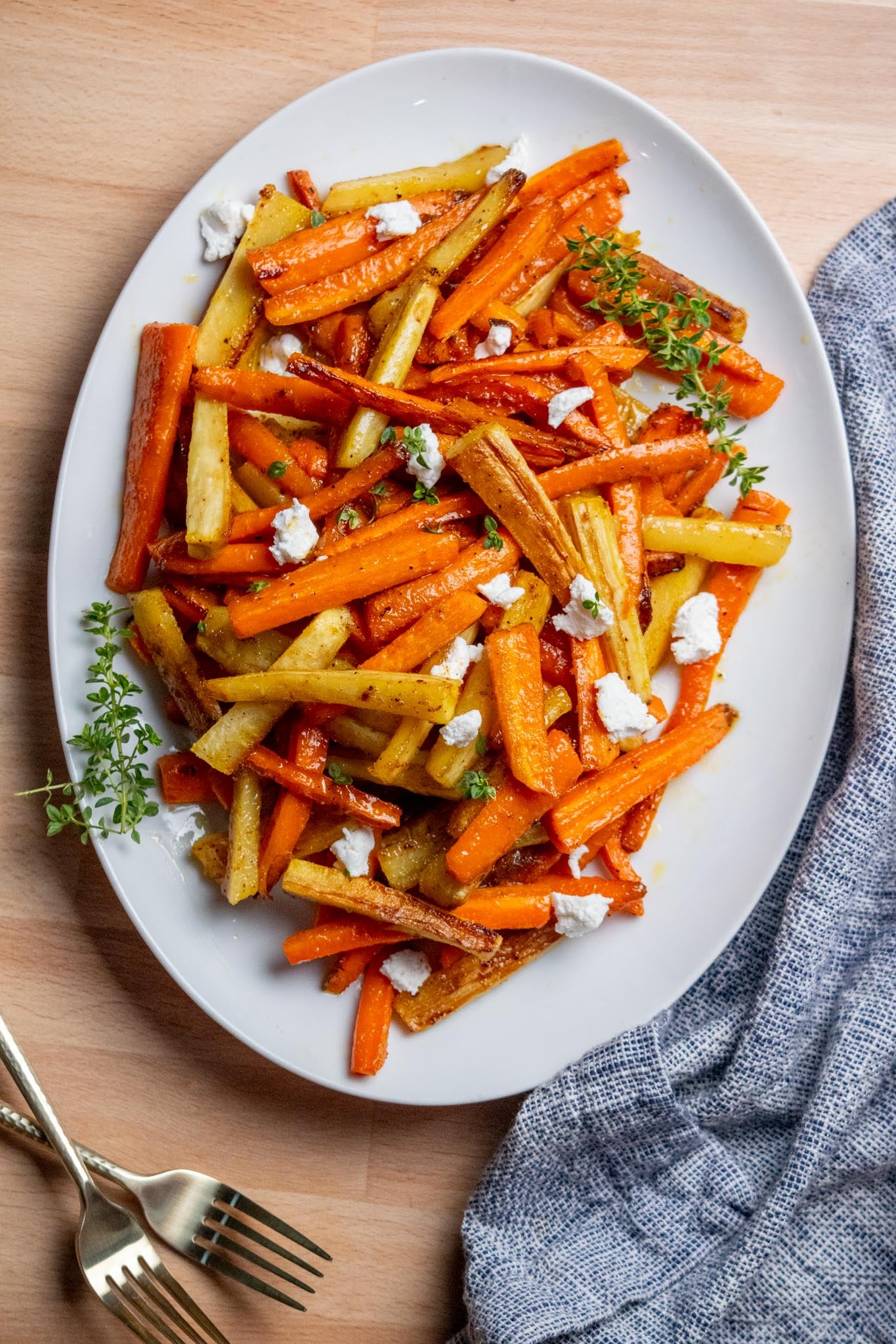 Finish with goat cheese. Transfer to a serving dish and crumble the goat cheese over the warm vegetables just before serving.