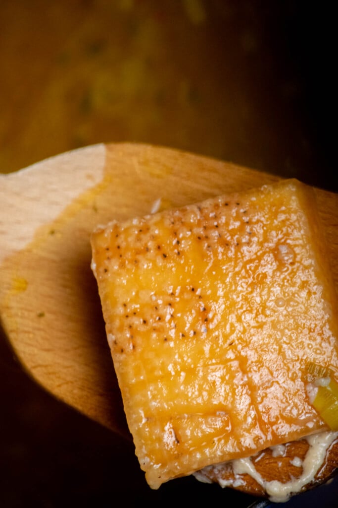 after 20 minutes, remove the parmesan rind, and discard. 