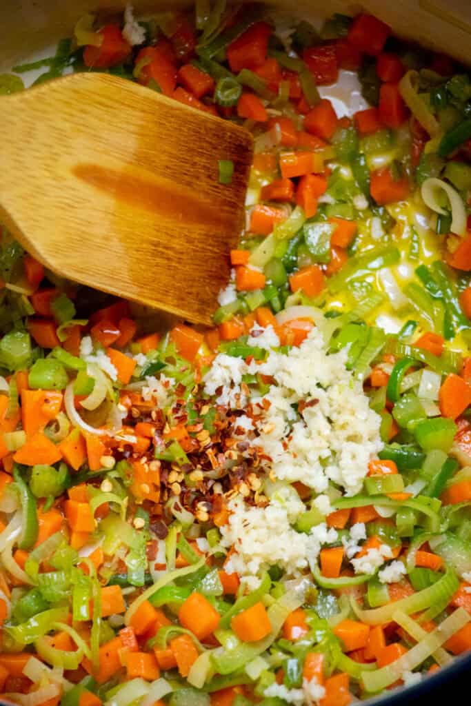 stir in garlic and crushed red pepper flakes, and cook 1 minute, until just fragrant. 