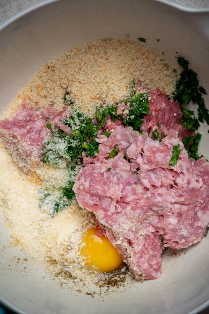 add all meatball ingredients to a large mixing bowl 