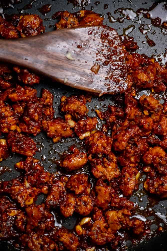 Cook tomato paste 2–3 minutes, until deep red.