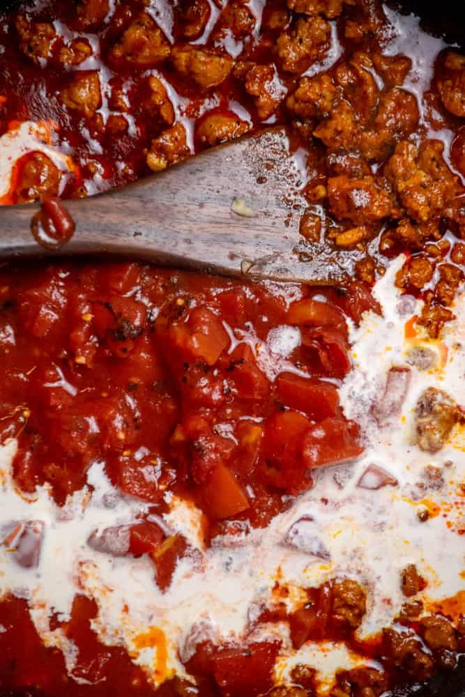 Stir in diced tomatoes and cream.