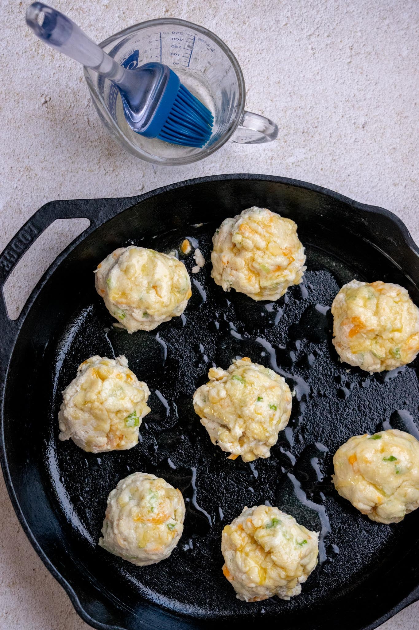 Brush the tops generously with melted butter.