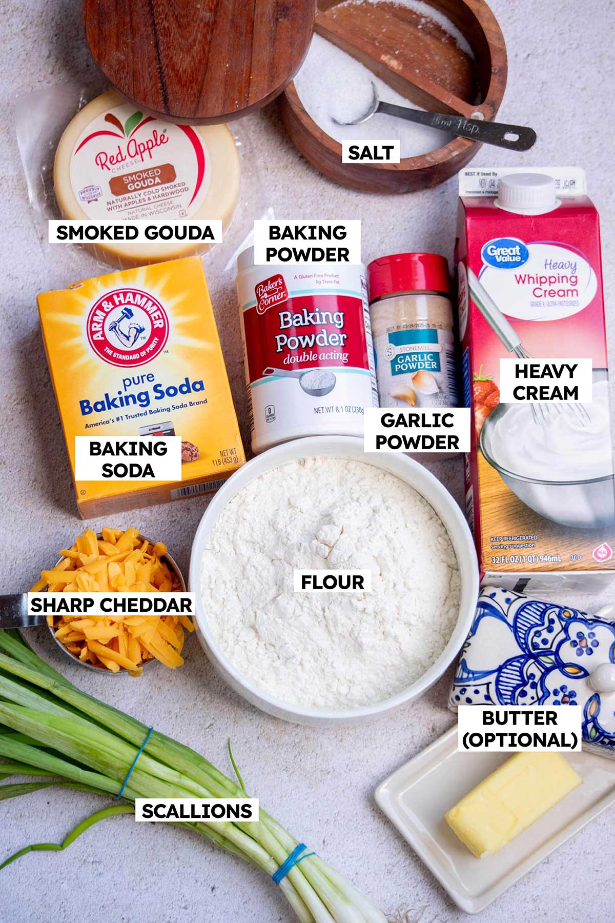 Cheddar cheese biscuit recipe ingredients on a counter. 