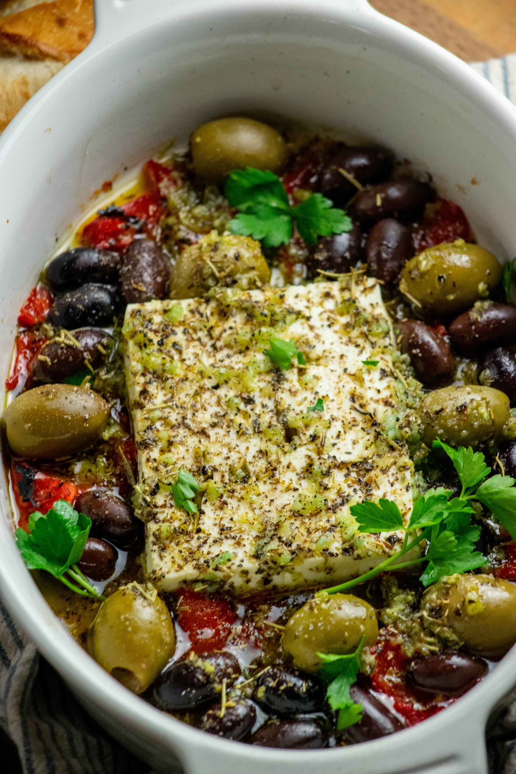 Bake for 20 minutes, until feta is soft and spreadable, and olives and peppers are lightly caramelized.