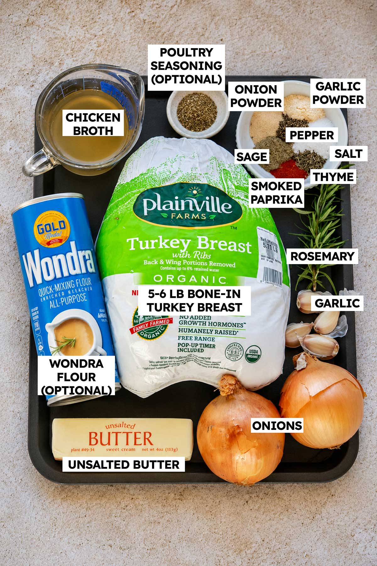 Ingredients for Crockpot turkey breast, including bone-in turkey breast, herb seasonings, butter, onions, garlic, chicken broth, and optional gravy ingredients.