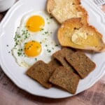 How to Cook Scrapple in the Air Fryer for breakfast- plated with eggs and toast.