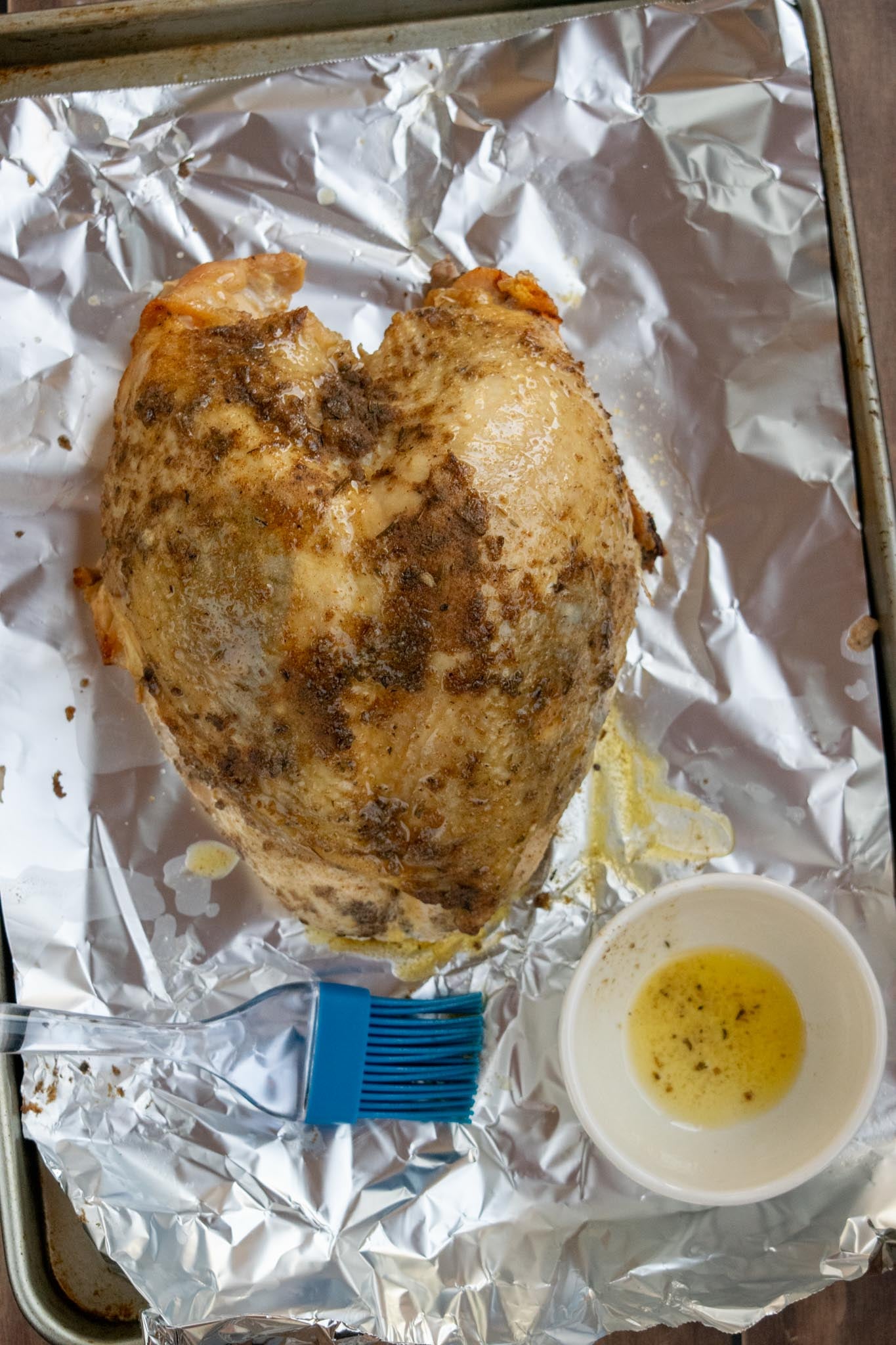 Broil the turkey (optional). Transfer to a baking sheet, pat the skin dry, and brush with melted butter. Broil on LOW on the middle rack until lightly golden, then rest for 20–30 minutes.