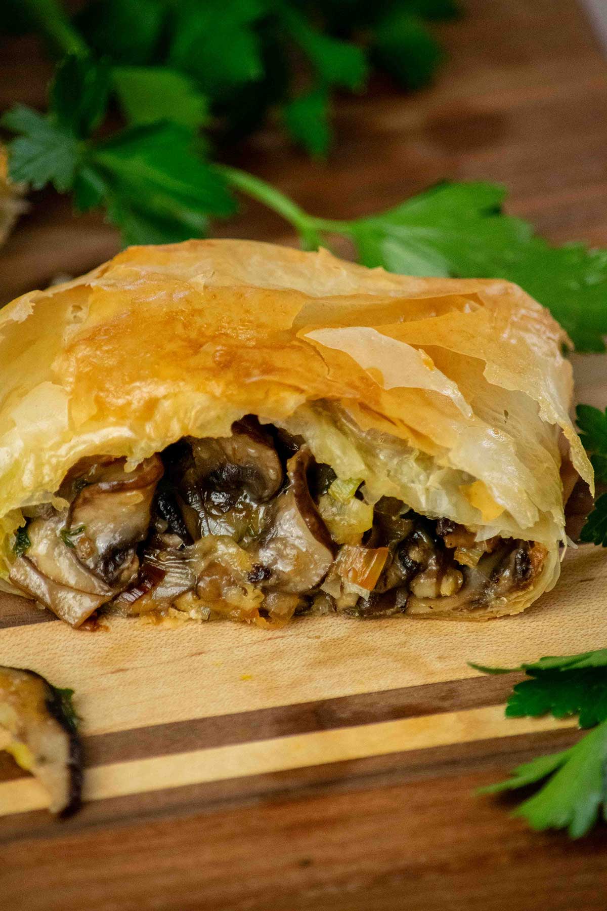 Slice of Vegetarian Strudel with Mushrooms and Leeks.