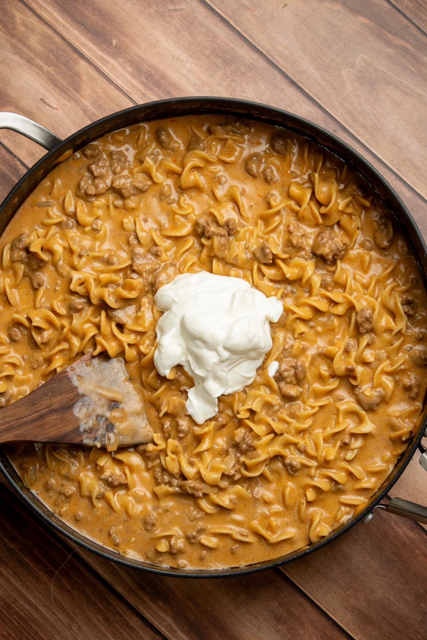 Finish with sour cream. Remove the skillet from the heat and stir in the sour cream until creamy and smooth. Serve hot with chopped parsley, if desired.