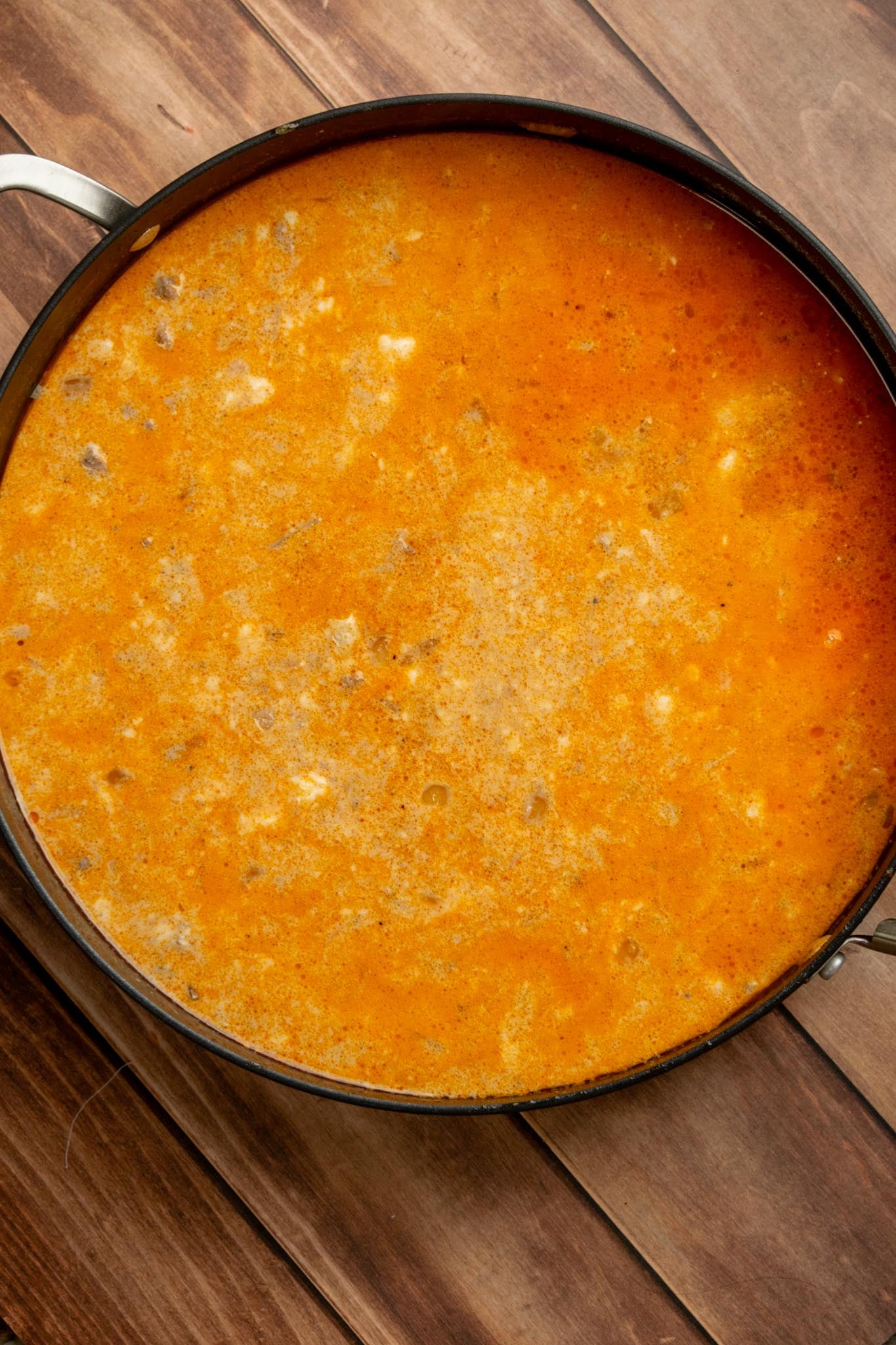 Build the sauce. Slowly whisk in the beef broth, then stir in the milk, Dijon mustard, Worcestershire sauce, and cream of mushroom soup until smooth and well combined.