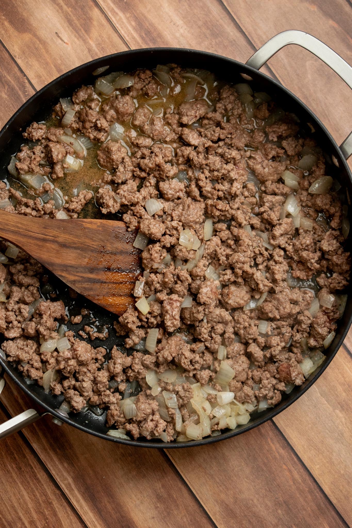 Brown the ground beef. Add the ground beef and cook, breaking it up as you go, until browned, about 4–5 minutes.