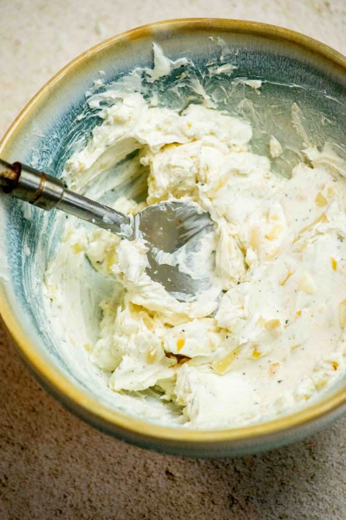 Mix together softened cream cheese, smoked gouda, pepper and garlic powder