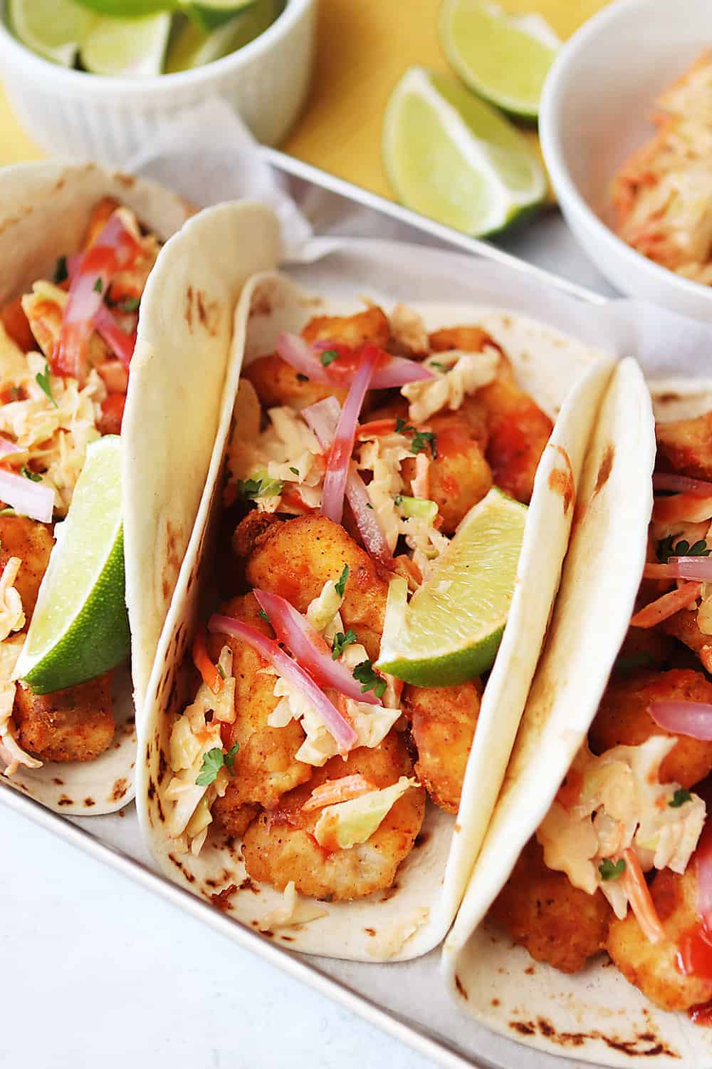 Air Fryer Fish Tacos with Spicy Slaw and Pickled Onions