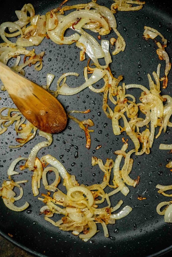 cook sliced onion until lightly browned