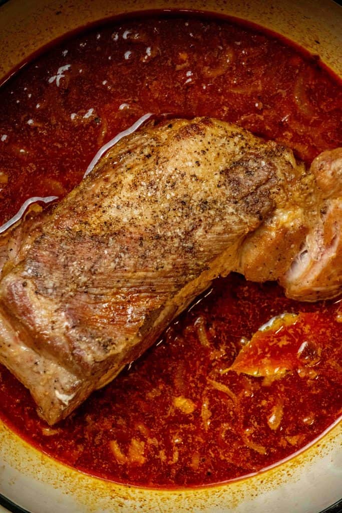 add pork and accumulated juices back to pot, cover, and transfer to preheated oven