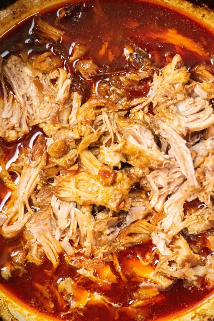 add shredded pork back to cooking liquid