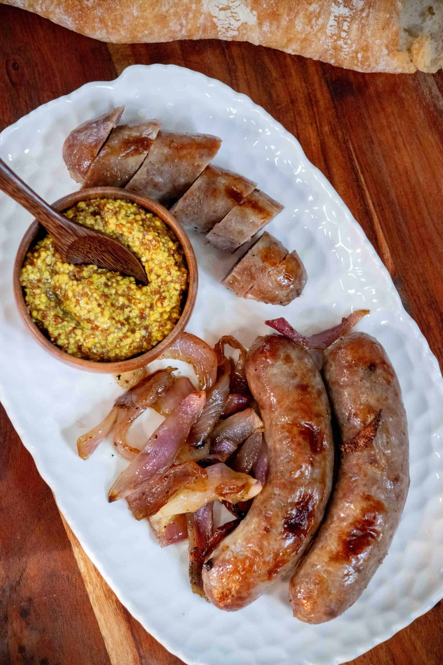 bratwurst with onions and mustard