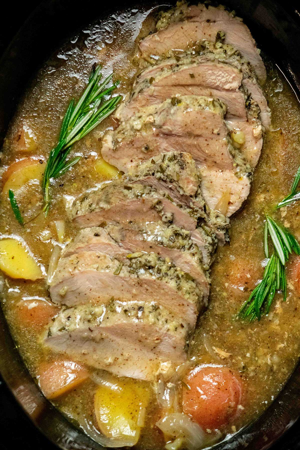 Rest, make the gravy, and serve. Transfer the pork to a cutting board and let it rest for about 10 minutes. Stir a cornstarch slurry into the potatoes and cooking liquid to thicken it into a gravy, then slice the pork and serve with the potatoes and gravy.