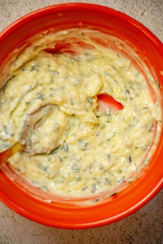 mix together the softened butter, chopped rosemary, and garlic